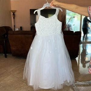 White flower girl dress. Never worn.